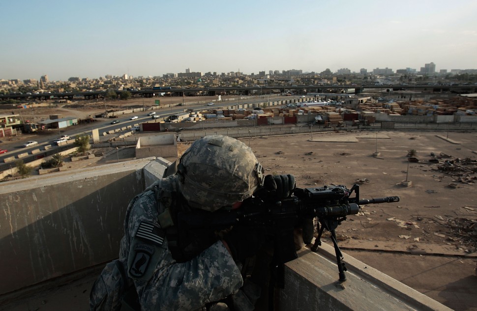 U.S. Soldiers Explore Abandoned Shopping Mall In East Baghdad