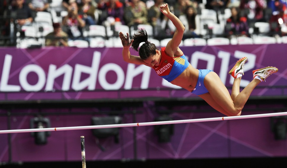 Russia's Yelena Isinbayeva competes in a women's pole vault qualification round during the athletics in the Olympic Stadium at the 2012 Summer Olympics, London, Saturday, Aug. 4, 2012. (AP Photo/David J. Phillip)