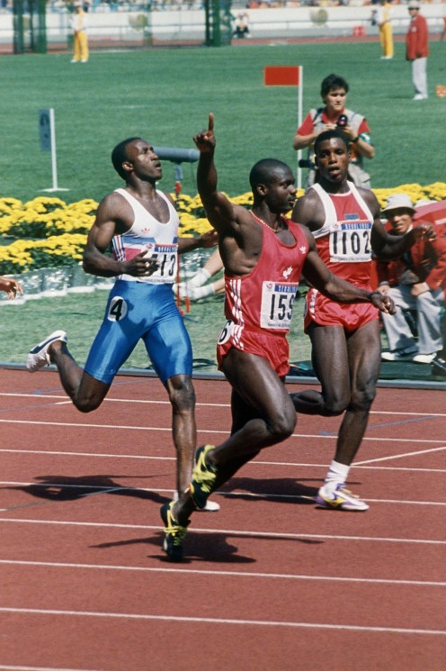 Ben Johnson of Canada gestures after winning the 100-meter dash beating Carl Lewis of the United states, behind at right, on September 24, 1988 at the Olympics in Seoul. The International Olympic Committee withdrew Johnson's gold medal for this event after he tested positive for steroids. (AP Photo/Fred Chartrand)