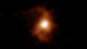 BRI1335-0417, uma galáxia primitiva com estruturas de braços espirais.