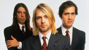 Dave Grohl durante o auge do Nirvana ao lado de Kurt Cobain e Krist Novoselic